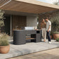 Couple cooking at the OVO GL outdoor kitchen on a garden terrace