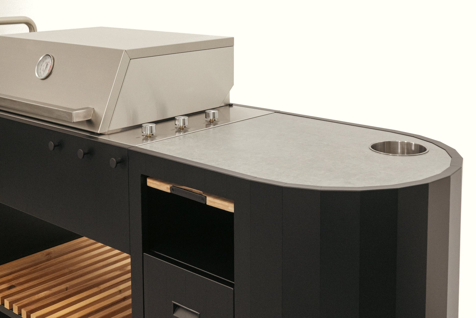 OVO GL - Dekton worktop with burner control knobs and built-in ice container
